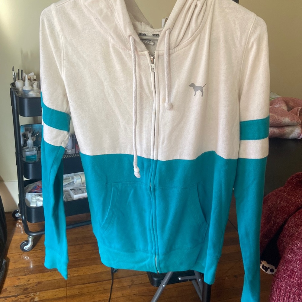 Pink white and teal zip up